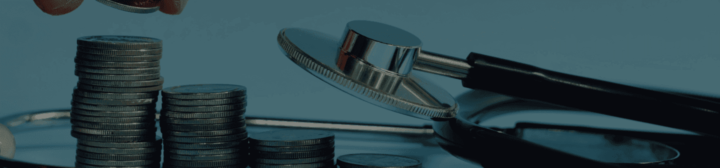 Faded coin and sthetoscope